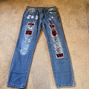 These are a Buffalo plaid denim pair of jeans. Size small